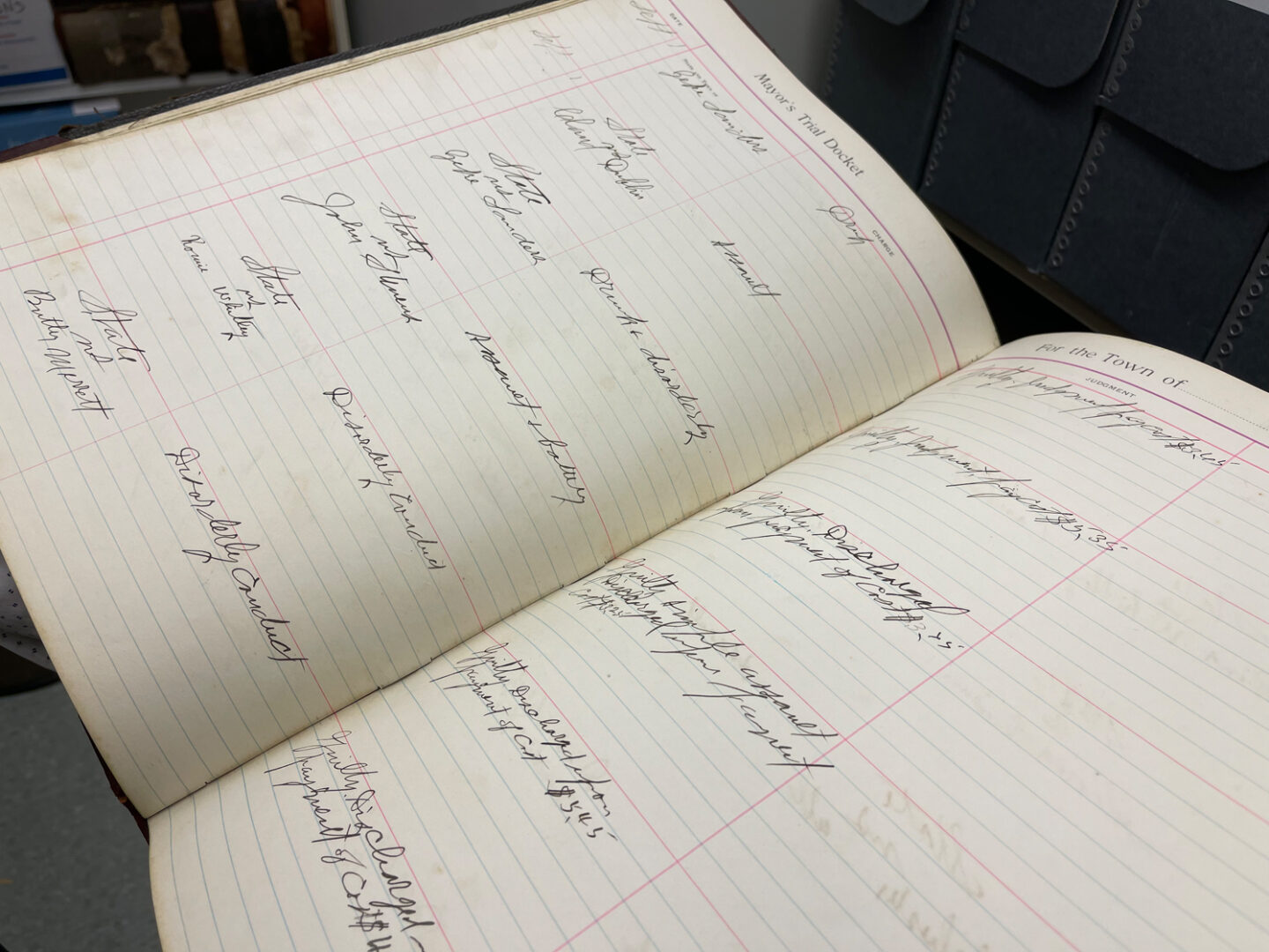 An Old Notebook With Black Color Writing